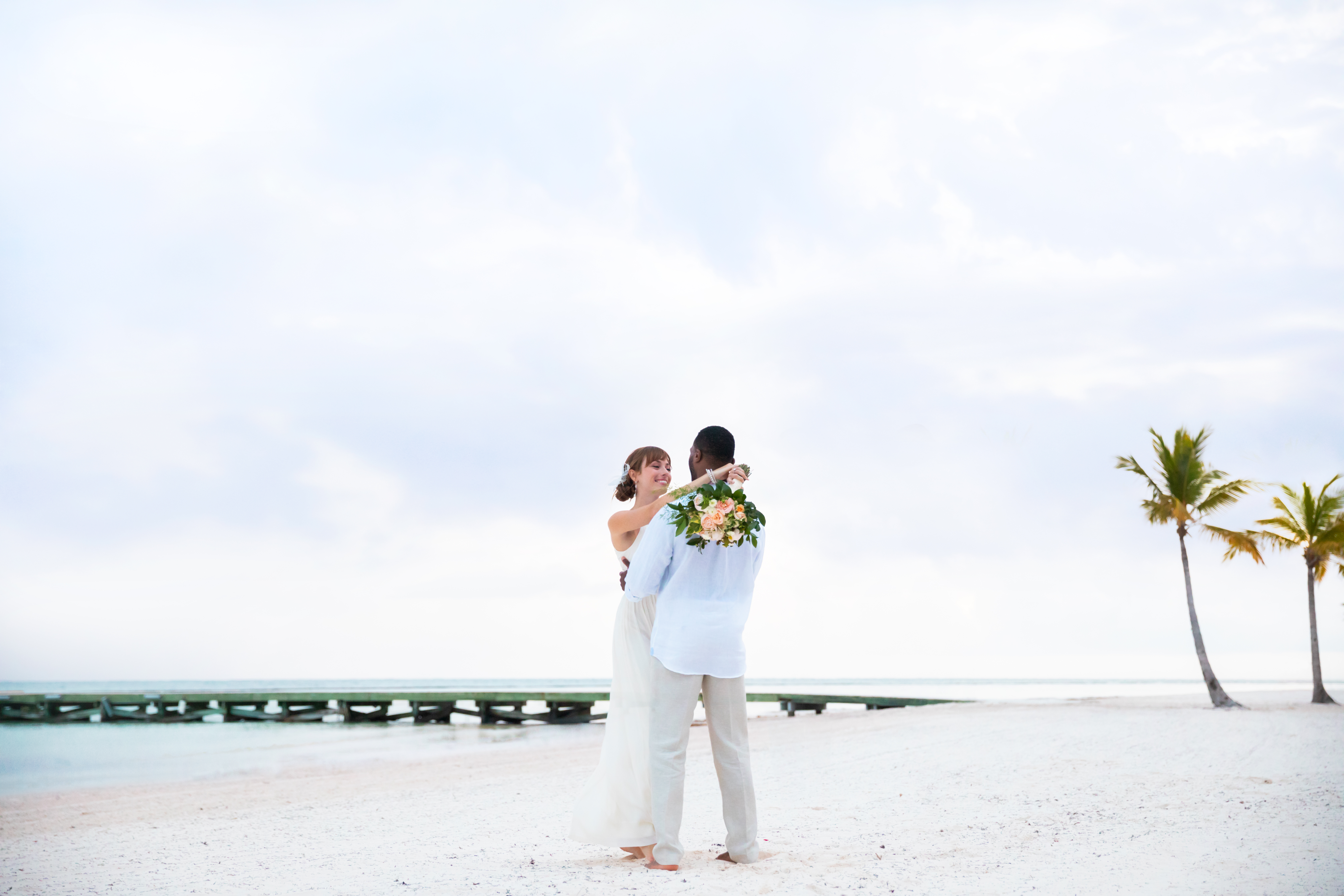 Newlyweds on the beach.