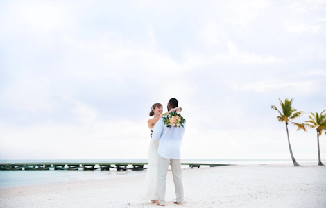 Newlyweds on the beach.