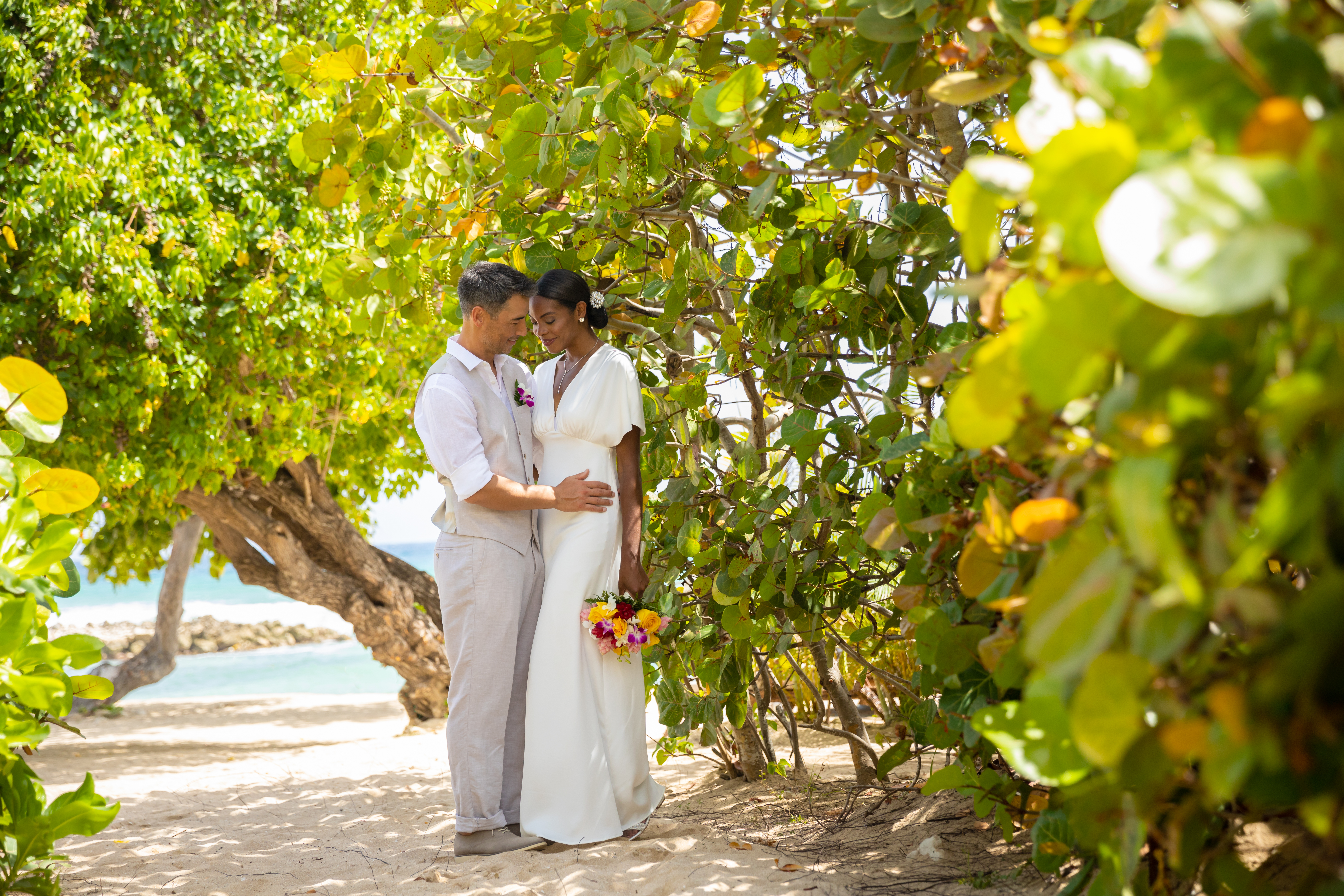 Newlyweds on the beach path.