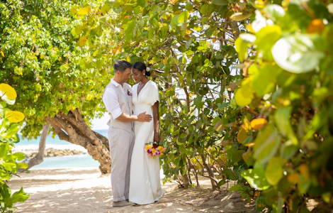Newlyweds on the beach path.
