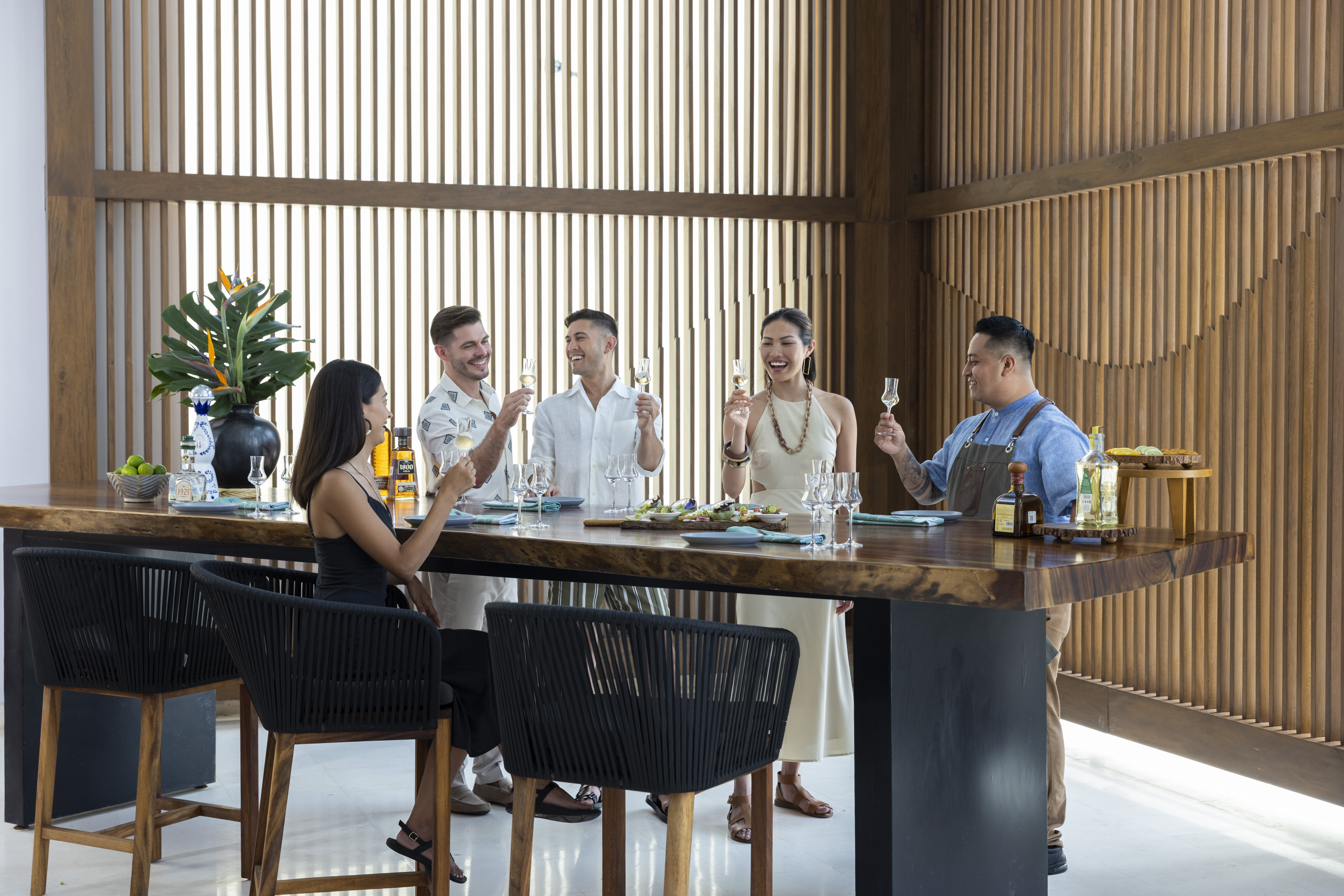 A group enjoying a tequila tasting.